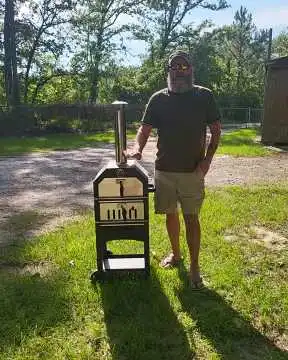 Watch the VEVOR Wood Fired Pizza Oven Outdoor in Action with Wood, Charcoal Cooking, Heavy Grill Plates, Ash Tray Control, and Whole Chicken Roasting