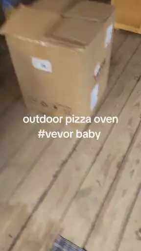 Watch the VEVOR Outdoor Pizza Oven Wood Fired in Action with Auto-Rotating Stone, Temperature Gauge, and Multi-Fuel Cooking Performance