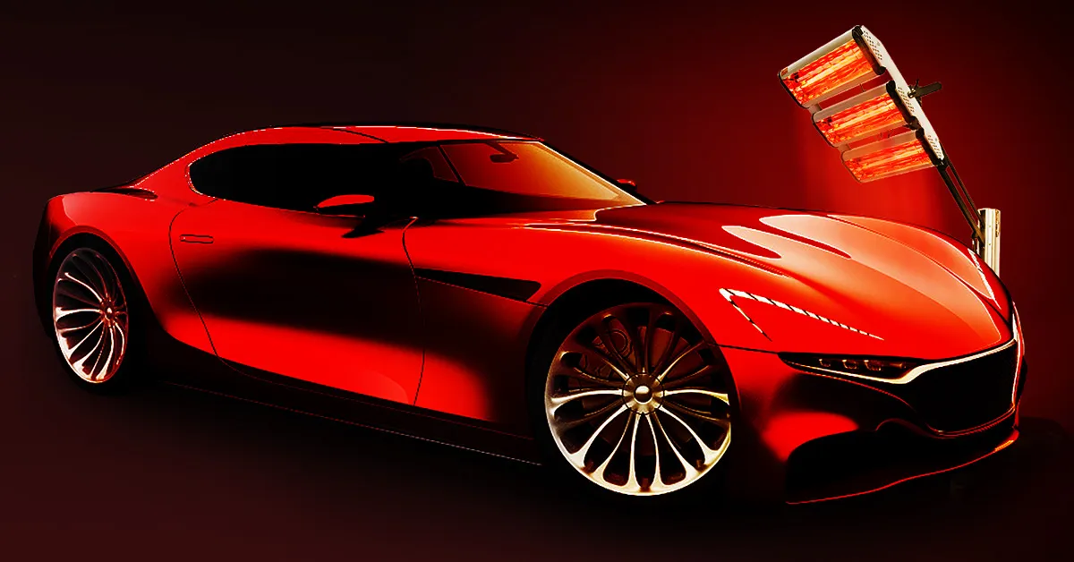 Coche deportivo rojo iluminado por la lámpara de curado de pintura infrarroja VEVOR con un diseño elegante.