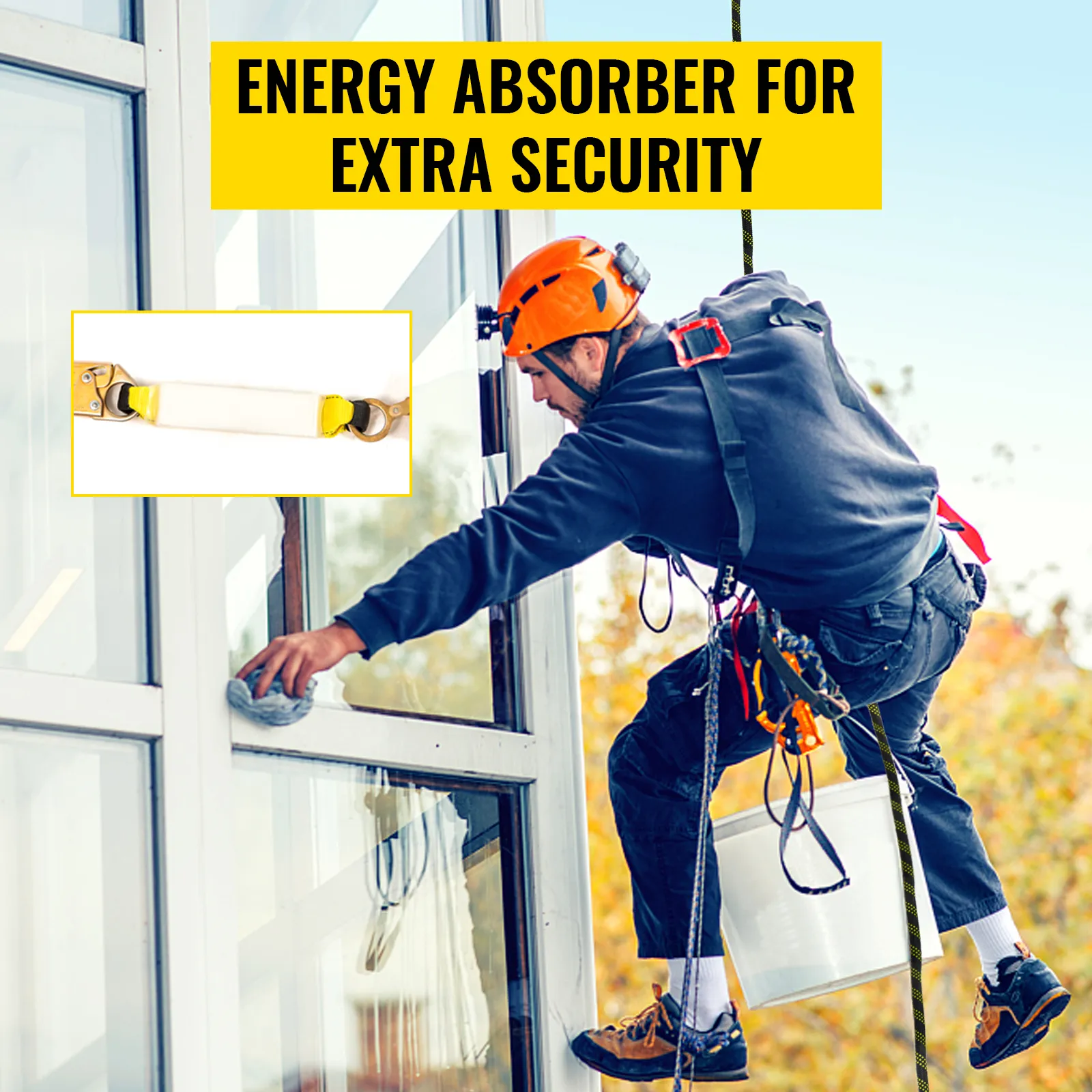 Trabajador limpiando ventanas con cuerda de protección contra caídas VEVOR y absorbedor de energía para mayor seguridad.