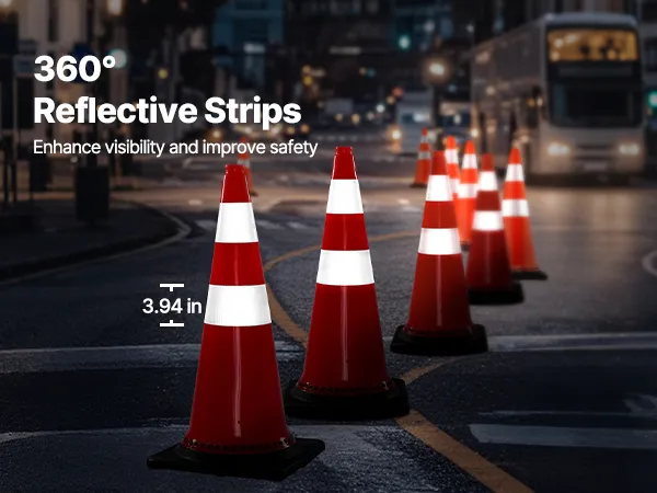 VEVOR safety cones with reflective strips and weighted base on a wet road.