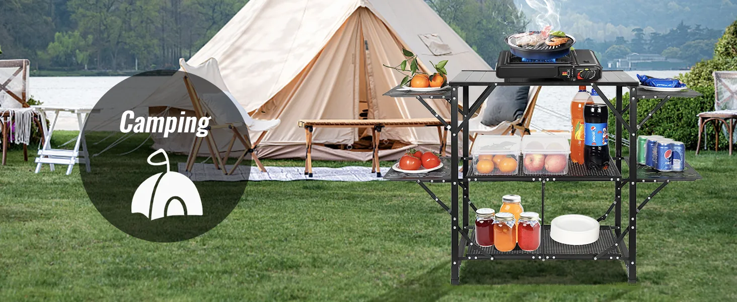 configuración de campamento con una tienda de campaña y una mesa de cocina de camping VEVOR que contiene alimentos, bebidas y herramientas de cocina.