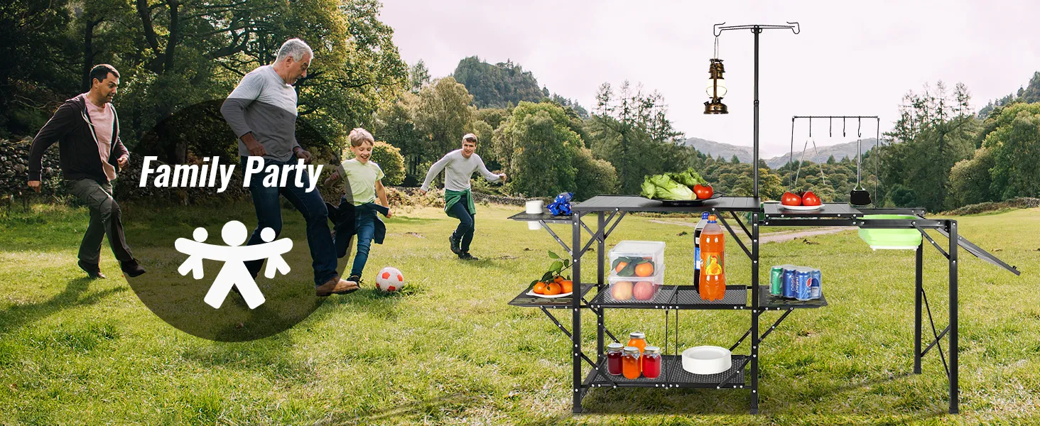 family enjoying outdoor activities with VEVOR camping kitchen table set up in a scenic meadow.
