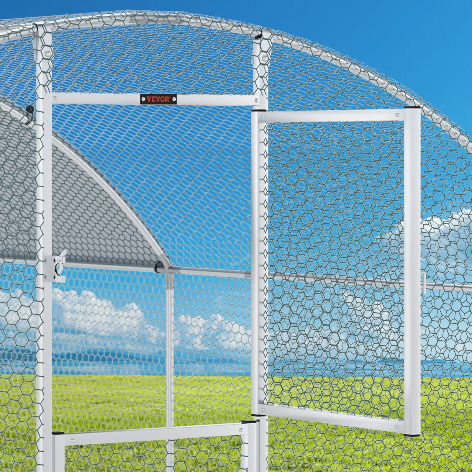 VEVOR chicken coop with metal mesh fencing and open door on a sunny day with blue skies and green grass.