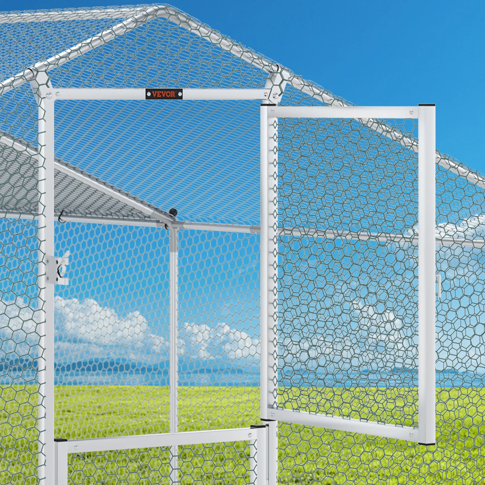 VEVOR metal chicken coop in a sunny field with a blue sky backdrop, highlighting the sturdy structure.
