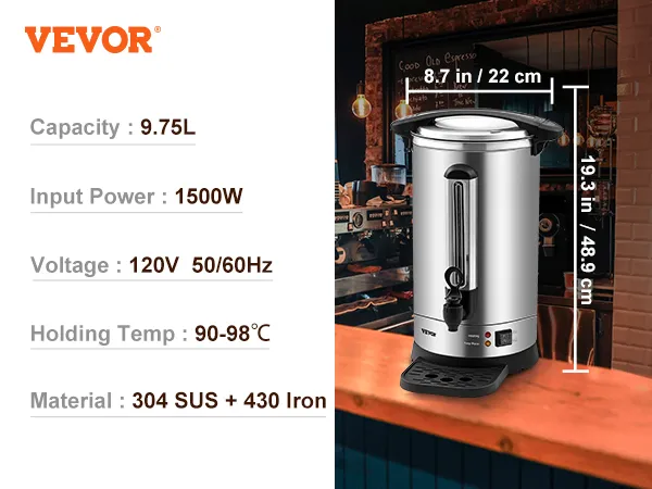 Cafetera VEVOR sobre el mostrador de una cafetería, con dimensiones resaltadas, cerca de una taza de café y granos.