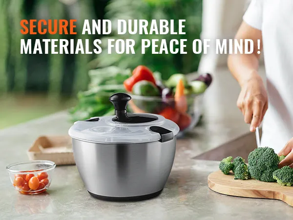 VEVOR roestvrijstalen slacentrifuge op een aanrecht met verse groenten en een persoon die broccoli snijdt.