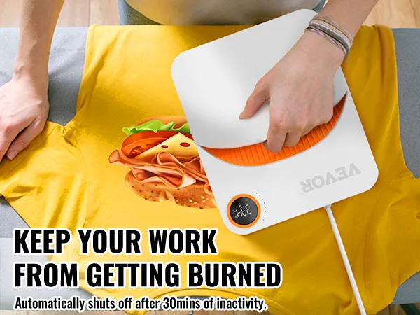 using the VEVOR heat press machine on a yellow shirt with a sandwich print, ensuring safe operation.