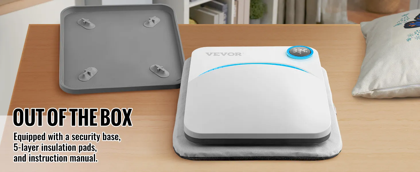 VEVOR-Heißpressmaschine auf einem Tisch mit Sicherheitssockel, Isolierpads und Bedienungsanleitung.