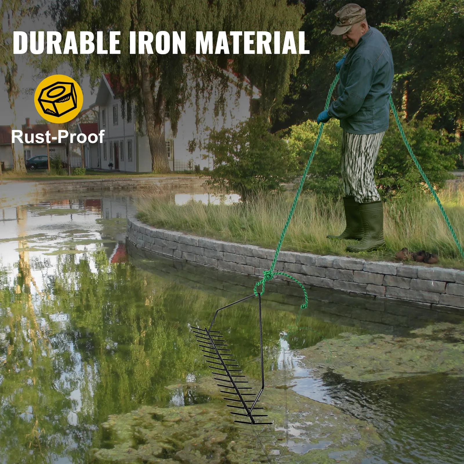 VEVOR pond rake being used by a person in green boots near a pond with algae.