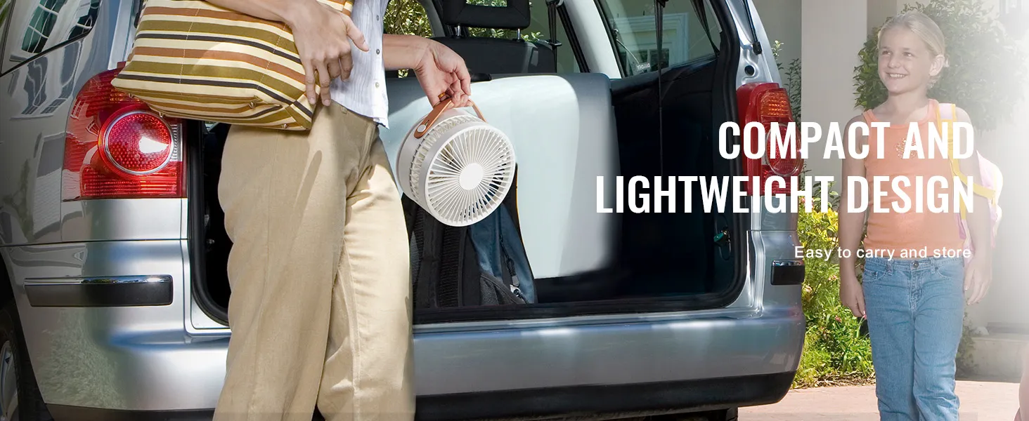 woman holding a VEVOR foldable oscillating fan near an open car trunk. text: "compact and lightweight design."
