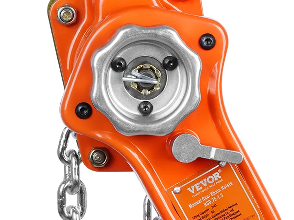 close-up of an orange VEVOR chain lift with a metallic gear and attached chains hanging down.