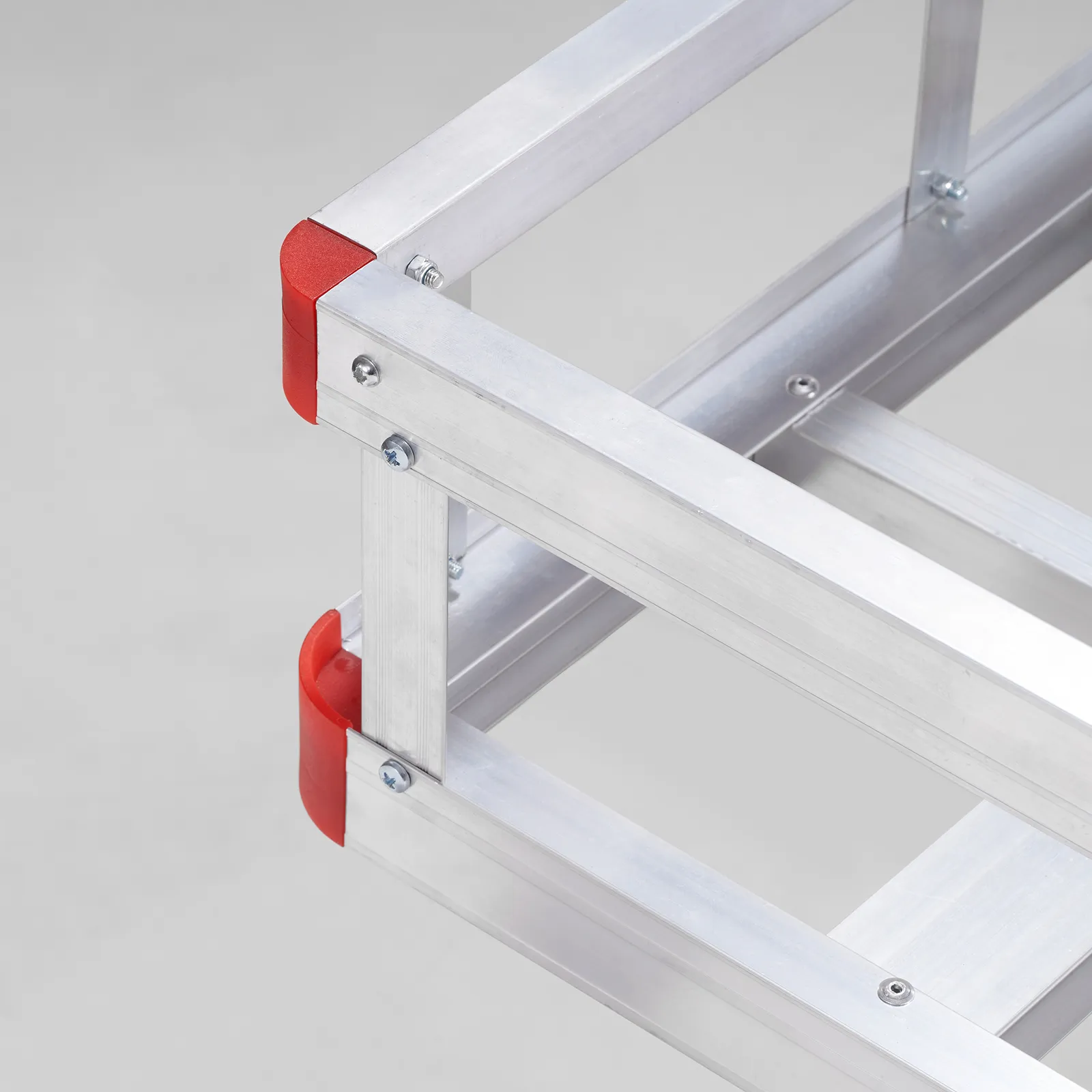 aluminum frame structure with red corner caps on VEVOR hitch cargo carrier.