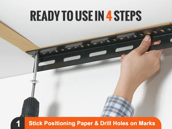 installing VEVOR overhead garage storage rack with a drill using premarked positions on ceiling.