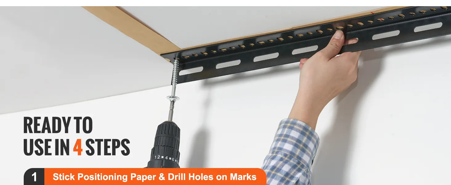 installing VEVOR overhead garage storage rack with a drill using premarked positions on ceiling.