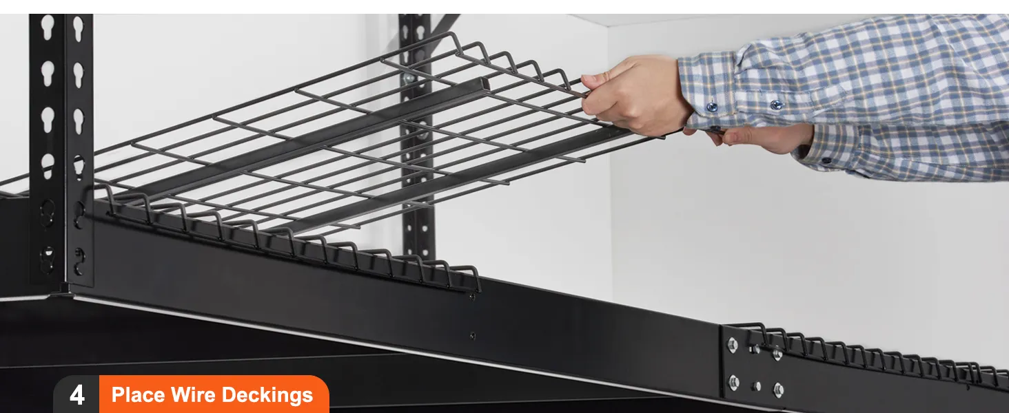 hands assembling a VEVOR overhead garage storage rack, placing wire decking on a black metal frame.
