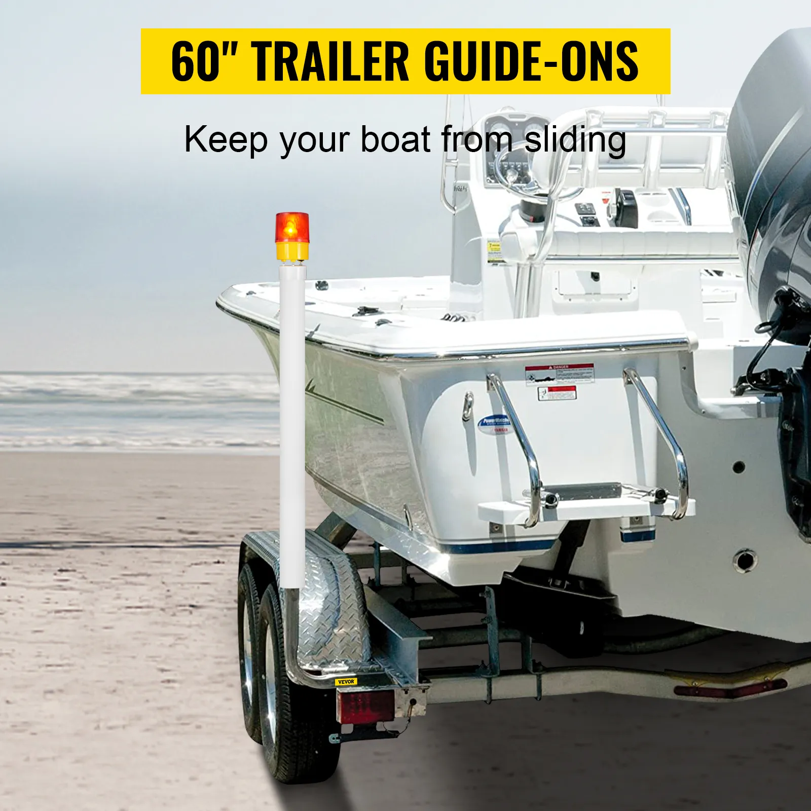 VEVOR boat trailer guide-on securing a white boat on a trailer at a beach with safety light on top.