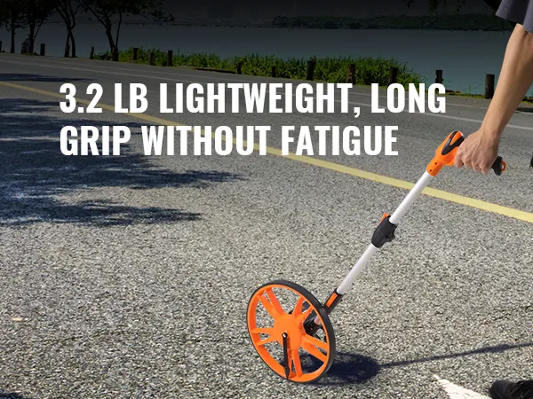 VEVOR measuring wheel in use on a road, highlighting its lightweight and ergonomic grip.