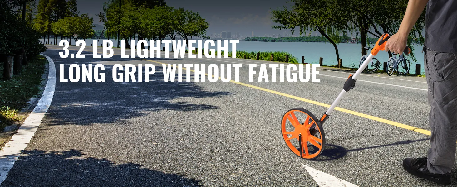 VEVOR measuring wheel in use on a road, highlighting its lightweight and ergonomic grip.