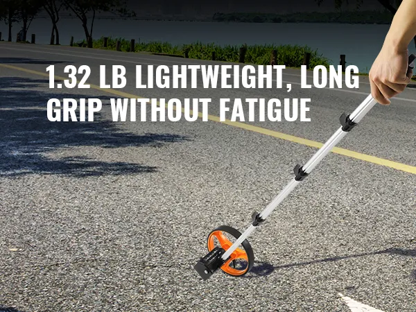 VEVOR measuring wheel being used on an open road; lightweight with long grip for fatigue-free use.