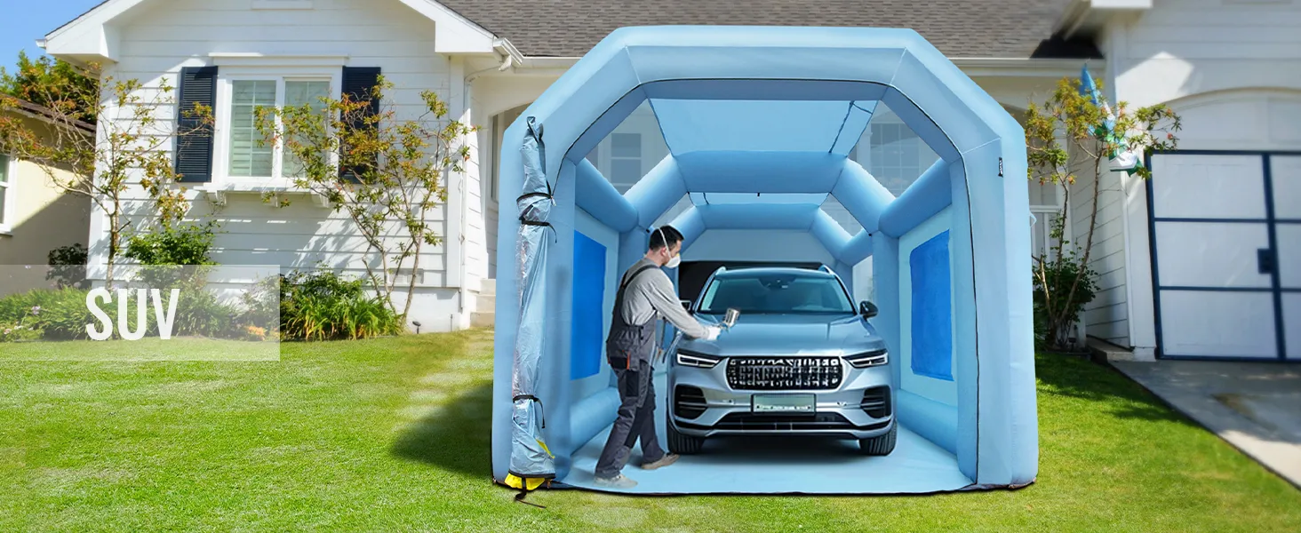 VEVOR inflatable paint booth with a black suv and a person detailing the vehicle in front of a house.