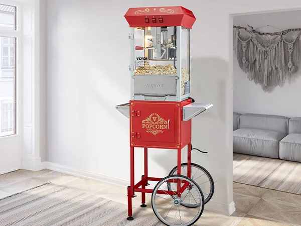 Máquina para hacer palomitas de maíz VEVOR roja con ruedas en una sala de estar moderna cerca de una ventana grande.