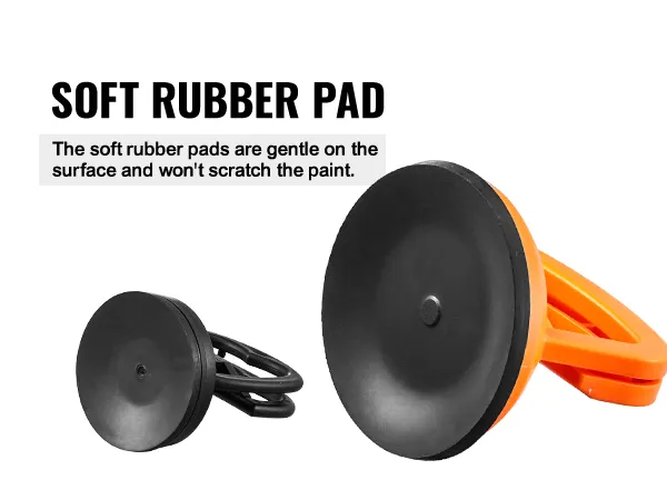 soft rubber pads on VEVOR dent removal kit, gentle on surfaces, won't scratch paint.