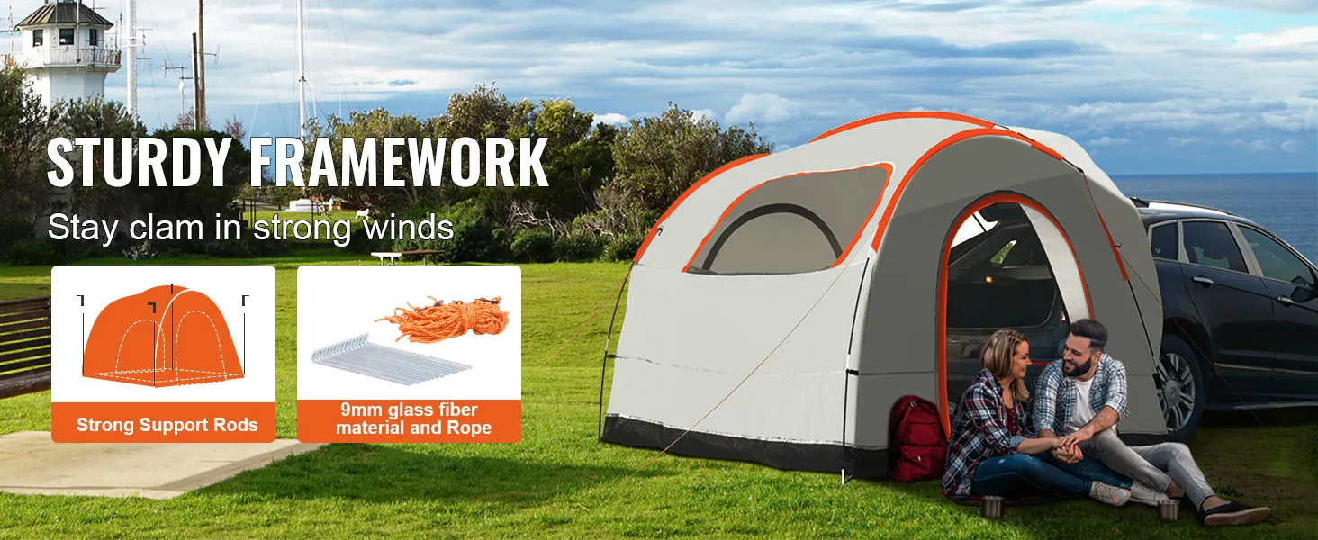 VEVOR suv camping tent set up by the ocean, showcasing sturdy framework with support rods and rope.