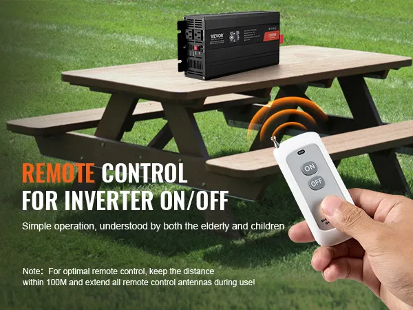 Control remoto para inversor de onda sinusoidal pura VEVOR en una mesa de picnic con una mano sosteniendo el control remoto.