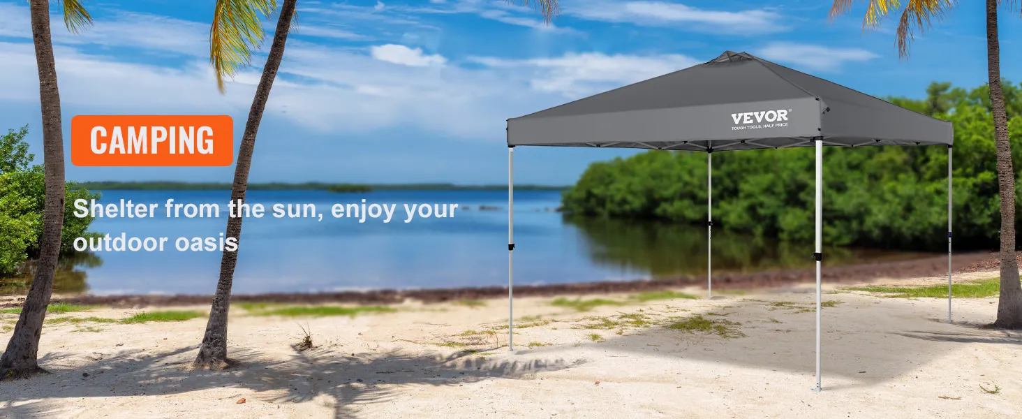 VEVOR pop-up canopy tent on a beach surrounded by palm trees, providing sun shelter for camping.