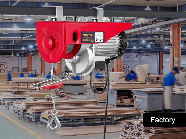 VEVOR 2200 lbs wireless attic lift in a busy factory setting with workers and woodworking equipment.