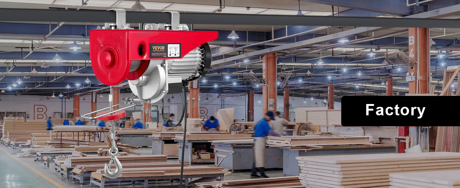 VEVOR 2200 lbs wireless attic lift in a busy factory setting with workers and woodworking equipment.