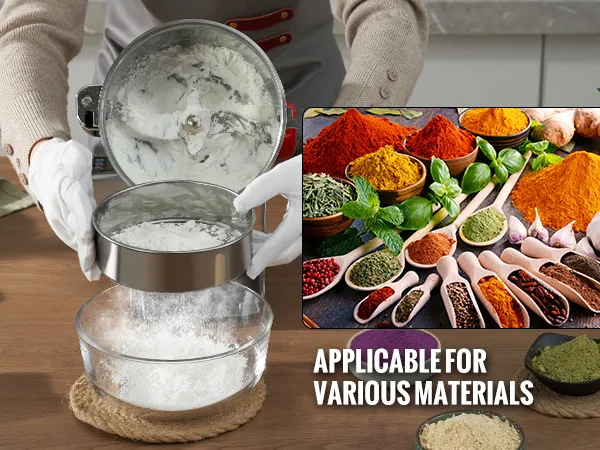 Manos operando el molinillo de grano eléctrico VEVOR junto a varias especias y hierbas coloridas sobre la mesa.