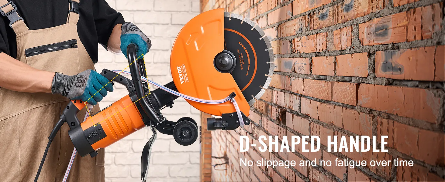 person using VEVOR electric concrete saw with orange d-shaped handle against a brick wall.