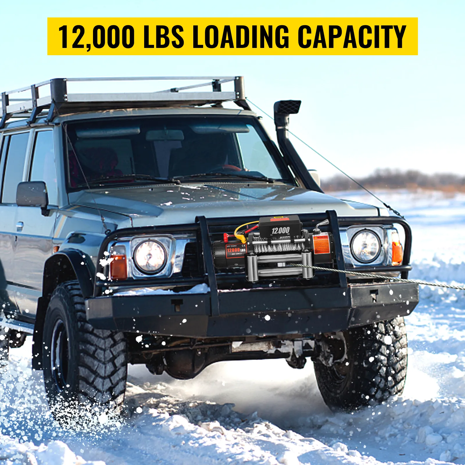 Cabrestante para camión VEVOR en vehículo 4x4 en terreno nevado con capacidad de carga de 12 000 libras.