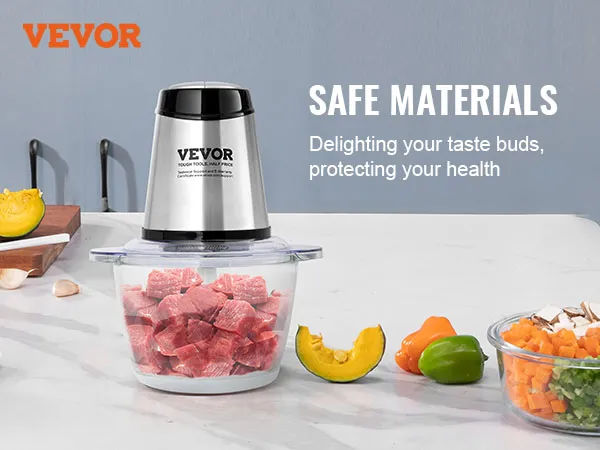 VEVOR electric food processor with chopped meat, tomatoes, squash, peppers, and mushrooms on a kitchen counter.
