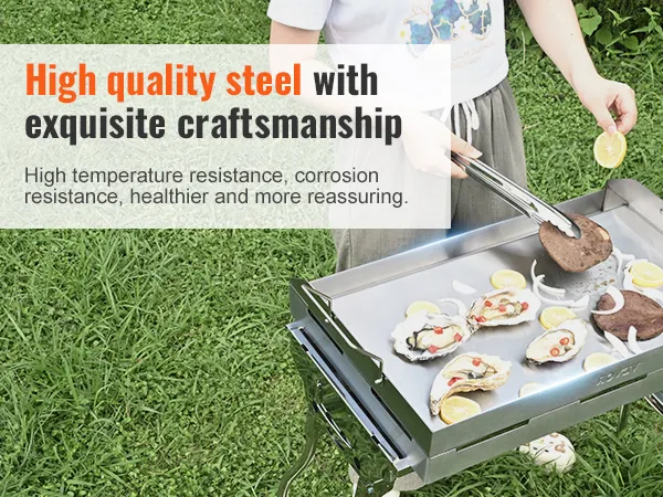 stainless steel VEVOR stove top griddle with cooked oysters and veggies on grass.