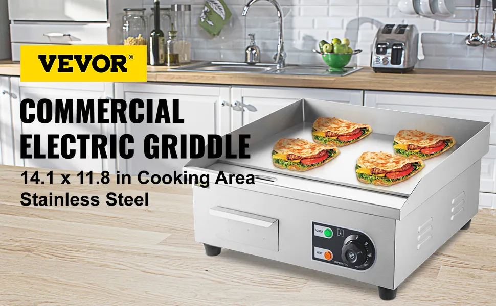 Plancha eléctrica VEVOR en la cocina con sándwiches sobre superficie de cocción de acero inoxidable.