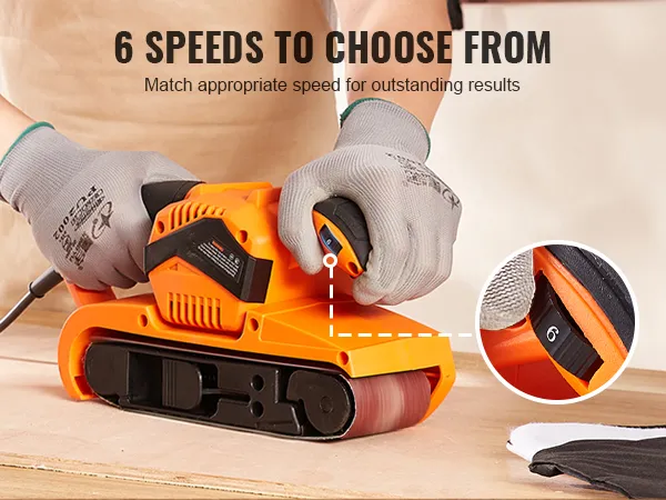 worker using VEVOR belt sander with adjustable speeds for precision sanding on a wooden surface.