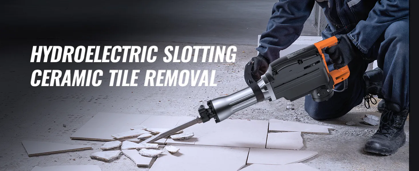 Trabajador que utiliza un martillo demoledor VEVOR para retirar baldosas de cerámica del suelo.