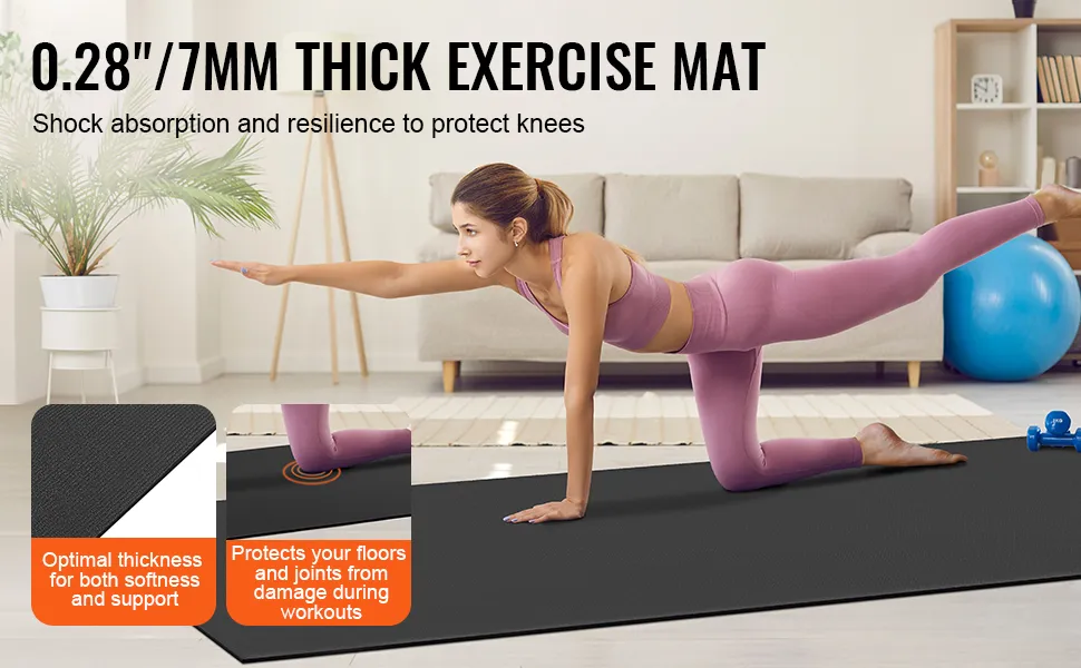 person doing yoga on a black VEVOR exercise mat, showcasing shock absorption and joint protection.