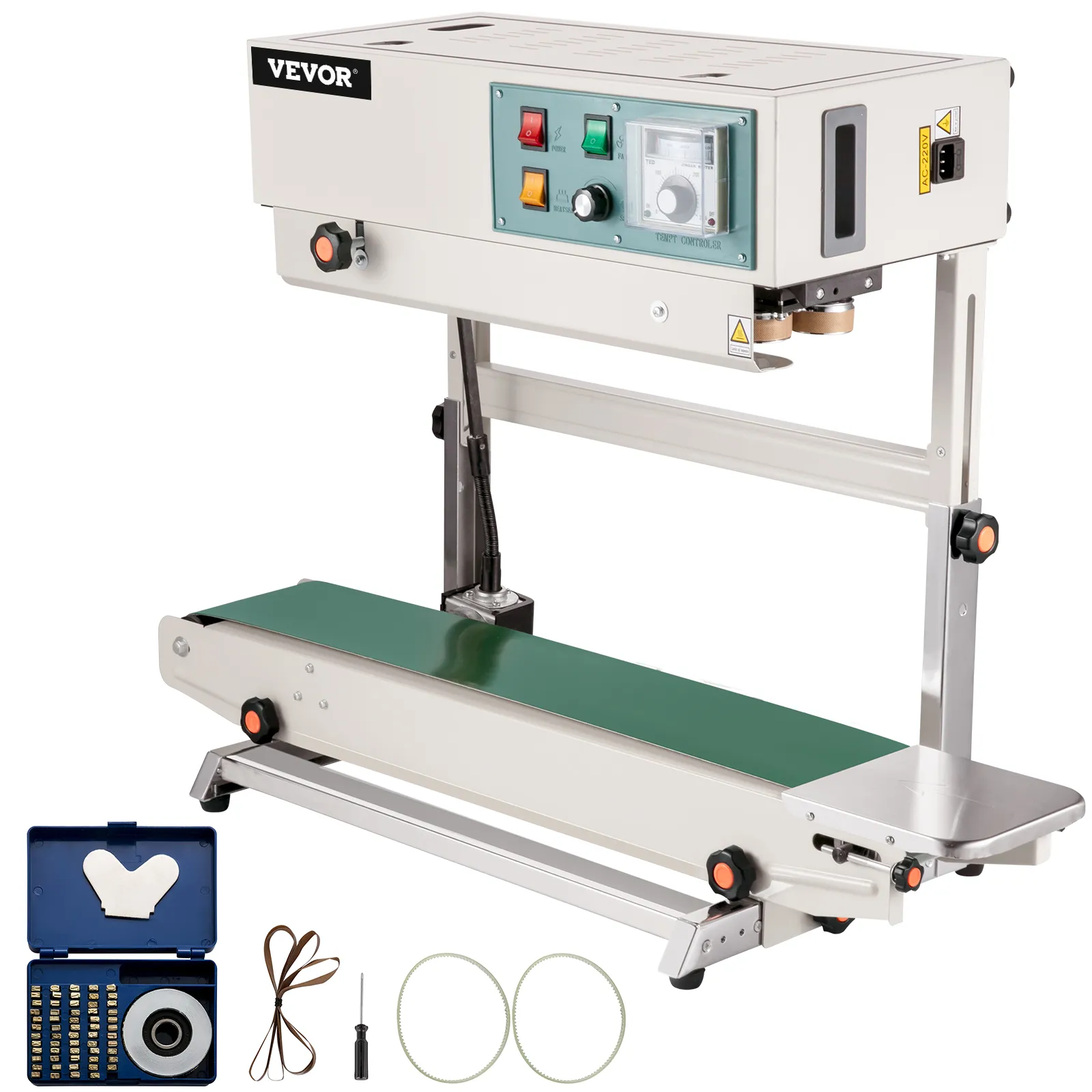 Selladora de banda continua VEVOR con accesorios que incluyen correas, destornillador y repuestos.