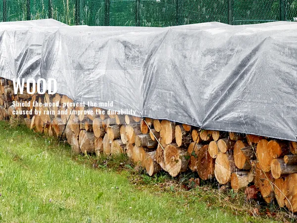 VEVOR waterproof tarp shielding stacked firewood in rain, preventing mold and enhancing durability.