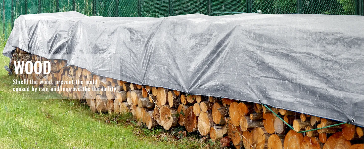 VEVOR waterproof tarp shielding stacked firewood in rain, preventing mold and enhancing durability.