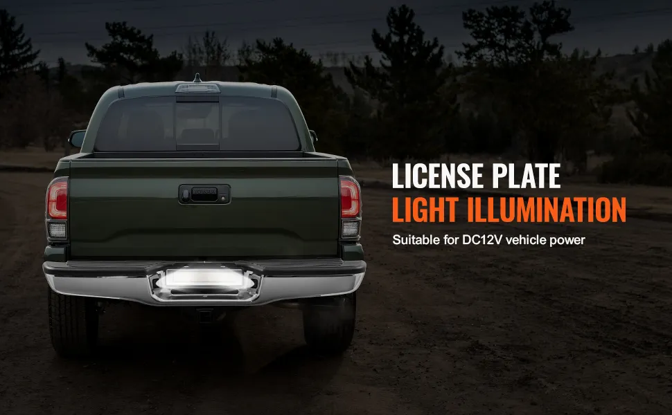 rear view of a green truck with a VEVOR toyota tacoma rear bumper and illuminated license plate.