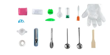 assorted kitchen utensils and accessories aligned on a white background.