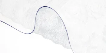 lace-patterned VEVOR plastic table cover with scalloped edges, partially folded on a white surface.