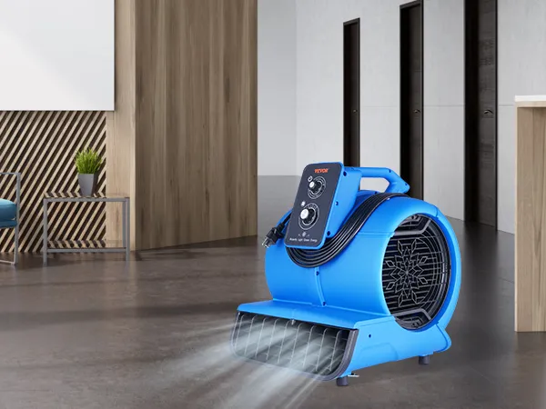 Oficina moderna con soplador de piso vevoor, silla azul, planta de interior y mostrador de mármol.