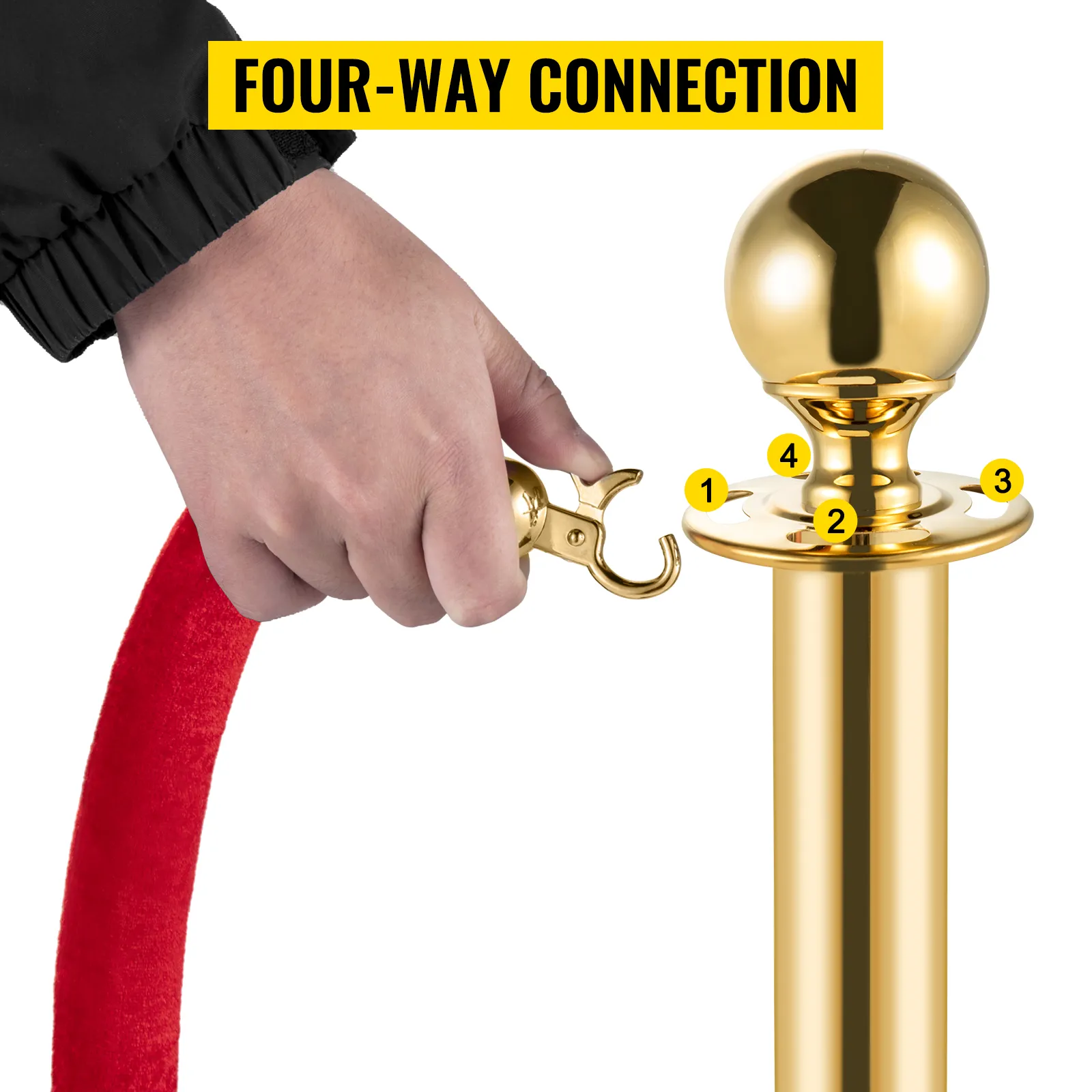 hand connecting a red rope to VEVOR crowd control barriers with four-way connection.