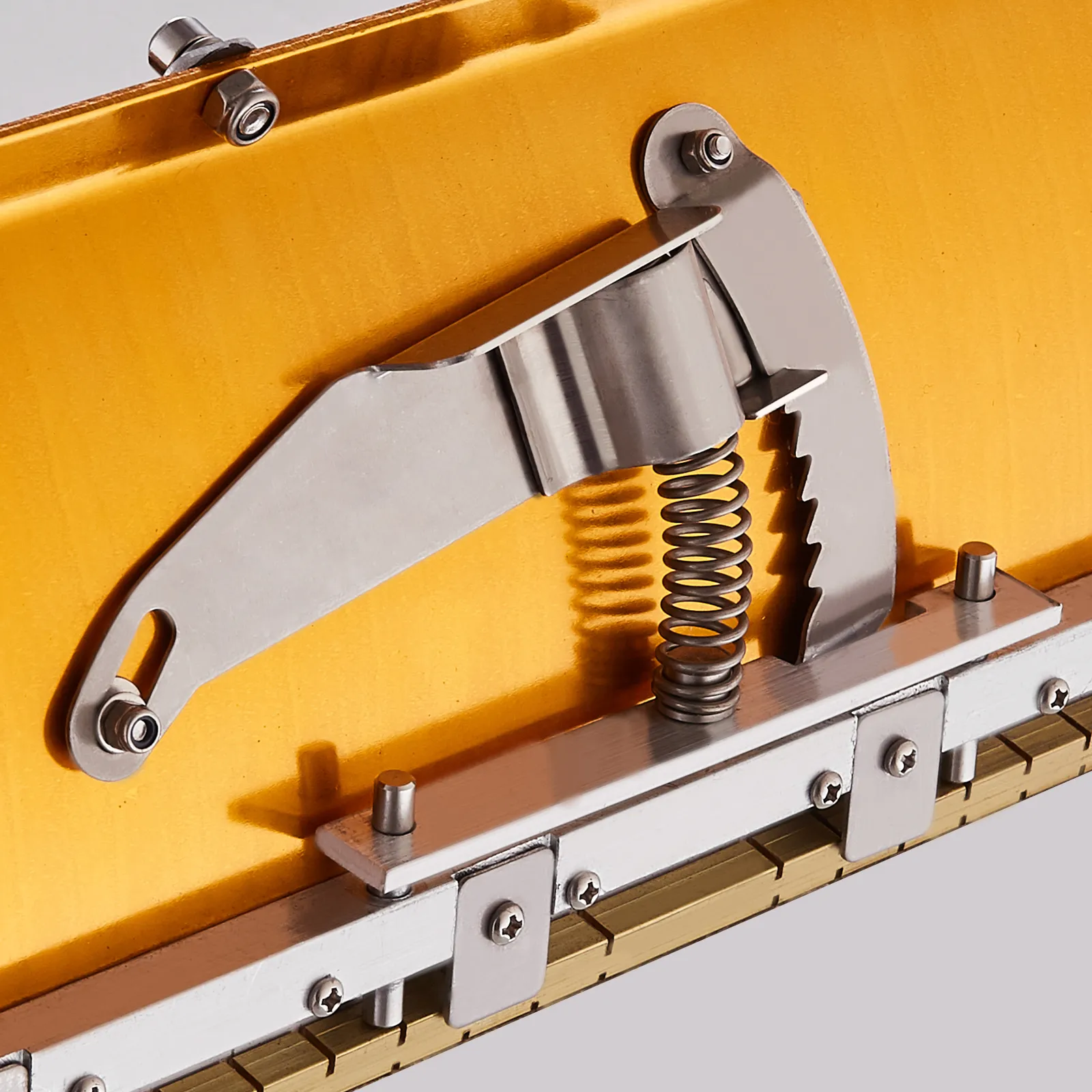 close-up of the VEVOR drywall flat box showcasing its stainless steel spring mechanism and metal body.